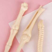Creative Bone-Shaped Pens With Various Designs, Including Realistic Bone-Shaped Ballpoint Pens And Skull Finger Designs. These Unique Gel Pens Feature Black/Blue Refills, Durable Metal Tips, And Are Compact And Innovative, Making Them Suitable For Doctors And Nurses. Perfect As A Halloween Gift, Holiday Present, Or Gift For Friends. - A - View 4