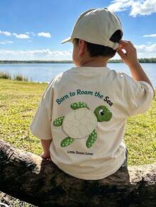 Young Boys Ocean Theme Print T-Shirt, Cartoon Turtle Patch & Round Letter Back Print, Breathable Summer Casual Short Sleeve Shirt - Apricot - View 1