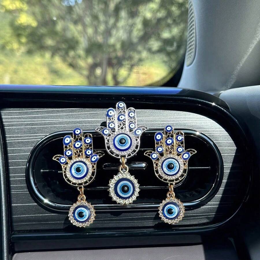 1pc Evil Eye Car Vent Decoration, Devil Eye Retro Fatima Hand Car Vent Clip, Antique Rhinestone Hollow Metal Pendant Car Vent Decoration, Bohemian Car Interior, Lucky Protection Car Parts Gift For Female Drivers - A - View 1