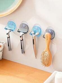 A Wall-Mounted, Multi-Functional Suction-Cup Holder Made Of Durable Plastic. It Features Strong Suction And A Non-Slip Design, Making It Suitable For Installation On Bathroom Or Kitchen Walls To Store Items Such As Razors And Towels. - Multicolor - View 10