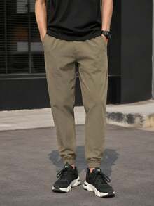 Under Armour Men's UA Icon Woven Jogger Casual Pants, Loose Fit Comfortable Minimalist Training Pants 6000663-251 - Quartz Gray - View 4