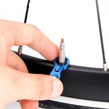 2 sets d'écrous de tige de valve de vélo en alliage d'aluminium, accessoires de valve de pneu sous vide, convient pour les vannes Presta de vélos de montagne ou de route, comprend une clé - Noir - Voir 6