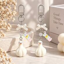 1pc/2pcs Women's 3D Flocked Garlic Bulb Duck Cartoon Pendant Bow Beaded English Letter "Nice" Accessory Keychain Cute Bag Charm - Multicolor - View 3