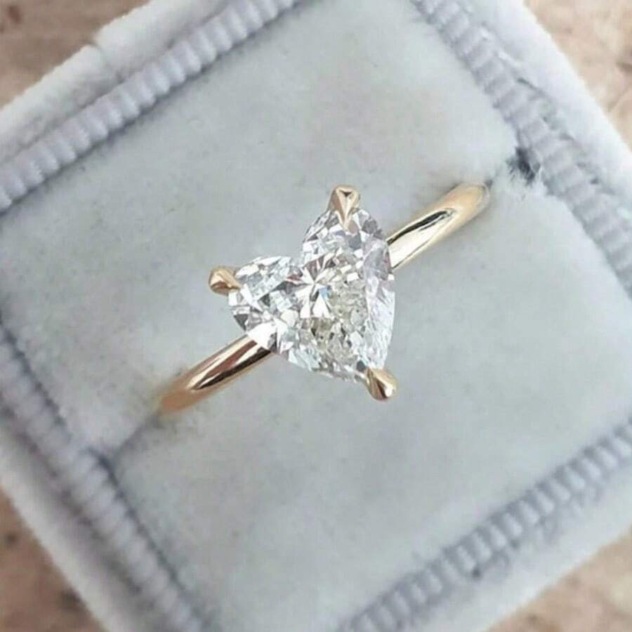 1 pieza Anillo de compromiso para mujer, adorno de piedra de circonita en forma de corazón de aleación de tono dorado simple, adecuado para uso diario, boda, compromiso, fiesta, joyería, Día