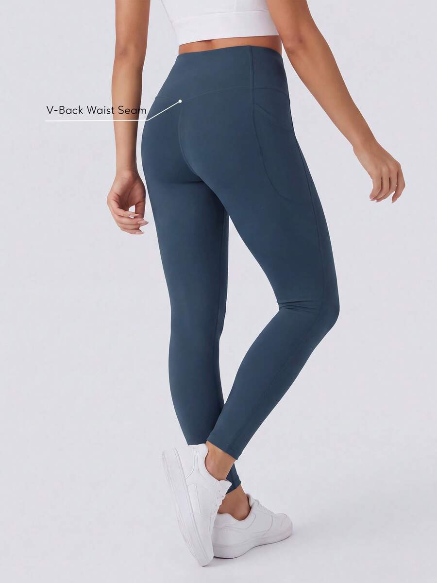 Sodalemon Women's High Waist Yoga Fitness Leggings Side Pockets Solid Color Seamless Front Running Workout Pants - Navy Blue - View 1