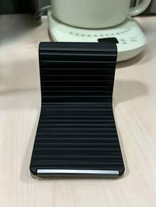 1pc Soft Silicone Phone Stand, Foldable Non-Slip Desktop Phone Holder, Adjustable Mobile Phone Stand, Compact Portable Phone Holder For Office Desk, Bedside Table, Travel, Orange & Black - Silicone Stand - View 3
