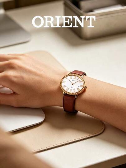 Orient Women's Oval Quartz Watch, Gold Case Pearl Mother Dial Crystal Bezel Beige Leather Strap Date Display 30M Water Resistant FUNEK005W0