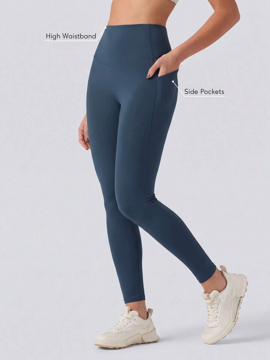Sodalemon Women's High Waist Yoga Fitness Leggings Side Pockets Solid Color Seamless Front Running Workout Pants - Navy Blue - View 1