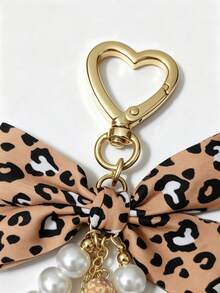 1pc New Leopard Print Fabric Bow Keychain, Sweet Faux Pearl Tassel Pendant With Gold Heart-Shaped Clasp, Key Ring, Car Bag Charm, Holiday Gift - Multicolor - View 4