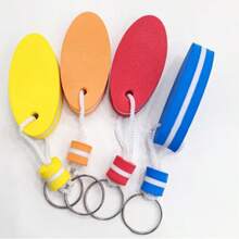 Floating Keychain, Automatically Floats When Dropped In Water To Prevent Keys From Sinking To The Bottom. Suitable For Beach, Pool, Boating, Fishing, And Water Activities. Can Be Attached To Keys, Backpacks, Diving Bags. Lightweight, Portable, And Brightly Colored For Easy Retrieval. Practical Accessory To Prevent Key Loss. - Random Color - View 1