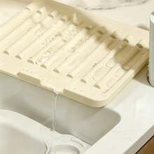2pcs/1pc Foldable Silicone Sink Drain Mat, Multi-Functional Retractable Draining Board, Kitchen Essential For Small Apartments, With Round Hole To Fit Faucet, Textured Ridges For Fast Drainage And No Water Accumulation, Waterproof And Non-Slip, Multi-Purpose. Can Be Used As Dish/Fruit/Vegetable Washing Station, Dish Soap/Sponge Storage Mat, Craft Anti-Stain Mat, Coffee Bar Drip Tray, Makeup Brush Drying Mat. Soft And Foldable, Can Be Hung For Storage After Use, Space-Saving, Fits Most Sinks, Perfect For Singles, Cleanliness Enthusiasts, And As A Gift. - White - View 5
