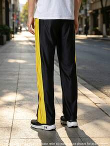 Under Armour Men's APAC Curry Snap Pant Lightweight Comfortable Loose Straight Leg Pants For Daily Sports And Casual Wear 6012759-001 - Black - View 2