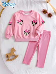 Disney Officially Licensed Baby Girls Sweatshirt Set, Spring/Autumn, Pink Color Block Sweet Cartoon Style, Round Neck All-Over Minnie Print Sweatshirt With Vertical Ribbed Slim Fit Long Pants, 2 Pieces Outfit For Toddlers Under 3 Years Old, Casual Daily Wear, Travel, Vacation, Party, Versatile - Baby Pink - View 1