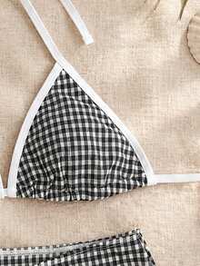 Bộ bikini 3 mảnh kẻ caro đen trắng cổ điển, thiết kế váy ôm sát cạp cao, mang đến cảm giác nghỉ dưỡng. - Nhiều màu - Xem 4