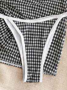 Bộ bikini 3 mảnh kẻ caro đen trắng cổ điển, thiết kế váy ôm sát cạp cao, mang đến cảm giác nghỉ dưỡng. - Nhiều màu - Xem 5