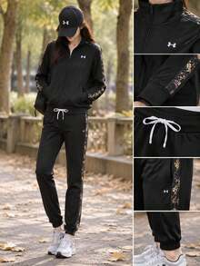 Under Armour Setelan Olahraga Tricot Wanita dengan Motif Samping dan Kerah Tegak, 1365147-005 - Hitam - View 3