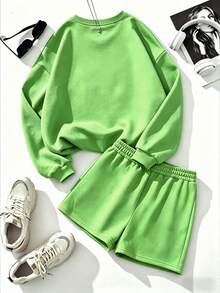 طقم رياضي نسائي من القطن الخالص للخريف والشتاء، مكون من قطعتين: بلوزة طويلة واسعة بياقة دائرية وأكمام طويلة مضلعة وبنطال واسع الأرجل - أخضر فاتح - مشاهدة 6