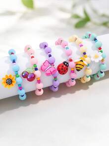 Bộ 6 vòng tay hạt chuỗi màu sắc dễ thương cho bé gái, vòng co giãn handmade kèm charm bướm, ong, bọ rùa, hoa hướng dương và hoa cúc, trang sức quà tặng tiệc cho bé - Nhiều màu - Xem 1