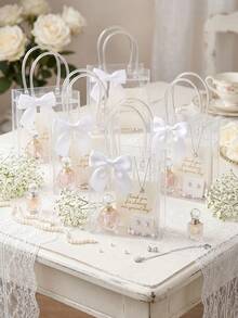 12pcs Transparent PVC Gift Bags With White Satin Ribbon, Waterproof Reusable Clear Tote Bags For Wedding, Birthday, Bridal Shower, Anniversary, Graduation Party - A - View 3