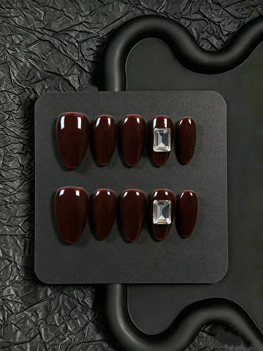 10pcs Handmade Press-On Nails, Pointed Almond Shape, Autumn/Winter Christmas Style. Deep Burgundy Solid Color Nail Surface With Rectangular Large Rhinestone Decor, Minimalist Elegant Style, Suitable For Christmas, Comes With Full Set Of Manicure Tools, Perfect For Women's Personal Use Or Gift - Brown - View 1