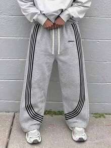 Light Gray Men's Sports Pants, Loose Fit, Wide Leg, Striped, Gym Pants, Side Stripes, Letter Print, Drawstring Waist, Sportswear - Light Grey - View 1