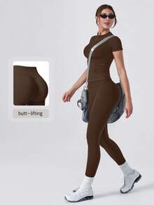 NcmRyu Women's One Set Solid Color Ribbed Seamless Crew Neck Short Sleeve Soft High Waist Ruched Athletic Tight Long Pants Set - Mocha Brown - View 1