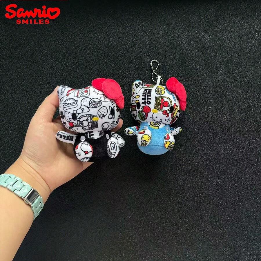 Móc khóa búp bê bông treo ba lô học sinh Sanrio hình mèo KT hoạt hình in họa tiết graffiti vui nhộn - Nhiều màu - Xem 1