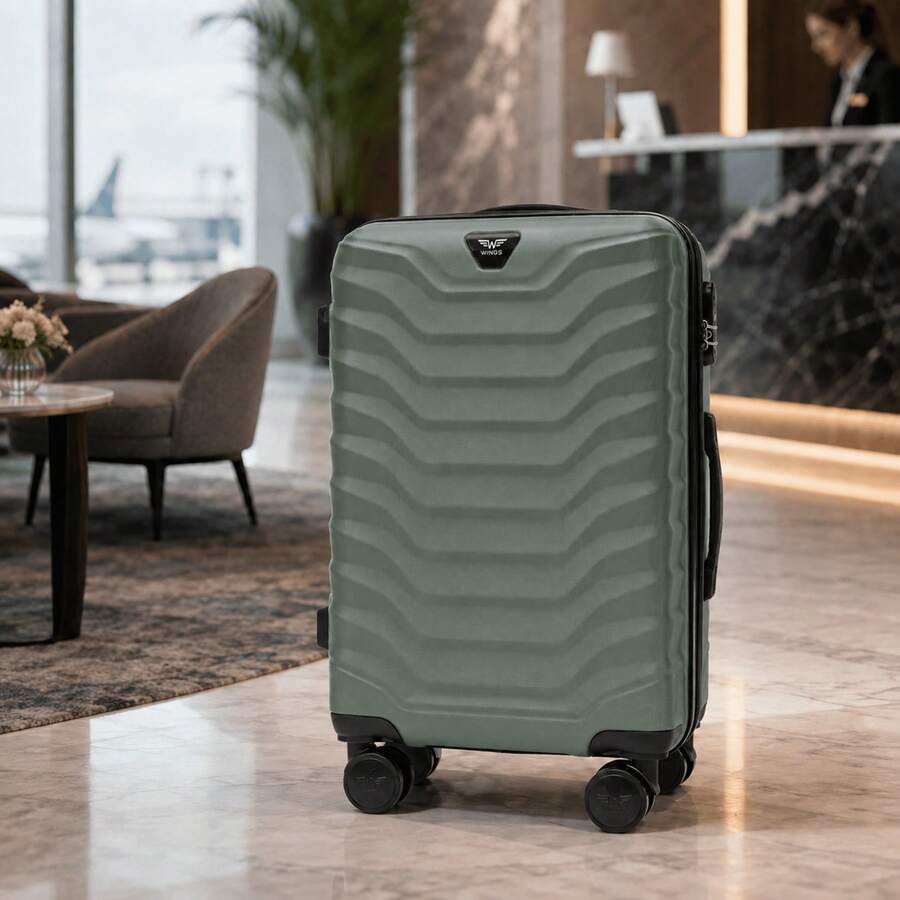 W WINGS مجموعة حقائب سفر 4 قطع | حقيبة تجميل، حقيبة مقصورة، حقيبة متوسطة وحقيبة كبيرة مع عجلات دوارة ومقبض تلسكوبي - أخضر عسكري - مشاهدة 1