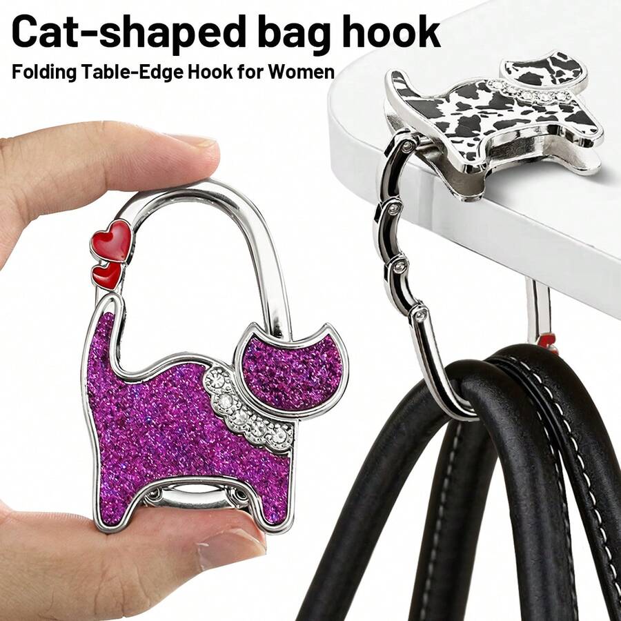 Cute Cat-Shaped Foldable Table Edge Hook, Compact And Portable, Can Be Carried In Bag. Simply Clip To Table Edge To Hang Bags And Handbags, Freeing Up Your Hands. Simple And Adorable Design, Both A Practical Storage Item And A Creative Gift For Women. - View 1