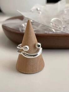 1pc Minimalist, Fun, Adjustable Open-Face Ring Features A Delicate And Playful Openwork Smile Design Made Of High-Quality, Hypoallergenic Stainless Steel. It's Fade-Resistant, Simple, Elegant, And Fashionable, Suitable For Both Men And Women. Perfect For Everyday Wear, Parties, Dates, Vacations, And As A Stylish Autumn/Winter Accessory. - Face - View 7