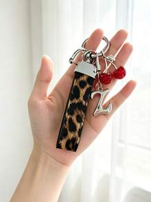 26 Alphabet Letter Keychain Pendant Creative Leopard Print PU Rope Key Strap, Cherry Charm, Car Keychain Pendant, Bag Charm Accessory, Key Decoration Accessory, 26 Letters To Choose From, Meaningful Gift For Family And Friends On Holidays - Brown - View 7
