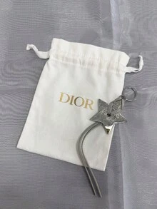 Bolsa de cosméticos con cordón y colgante de estrella de cinco puntas plateada de Dior - Plateado - Ver 1