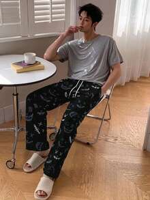 DAZY 男士描趣味表情印花休闲裤，带抽绳腰带和口袋，适合居家休闲或睡衣穿着。 - 黑色 - 查看 3
