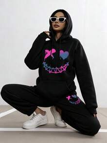 Bộ đồ mặc nhà 2 món nữ, áo hoodie tay dài và quần dài in họa tiết trái tim gradient graffiti & mặt cười - màu đen - Xem 1