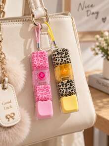 Nyckelring med leopardmönstrat 4-tangents tangentbord, klickbar fidget-knapp, magisk kub-stil bilnyckelring och väskcharm, taktil stresslindrande nyckelaccessoar för fokus och avslappning, födelsedagspresent, partyfavorit, julstrumpfyllare - Flera stilar - Visa 1