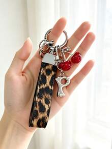 26 Alphabet Letter Keychain Pendant Creative Leopard Print PU Rope Key Strap, Cherry Charm, Car Keychain Pendant, Bag Charm Accessory, Key Decoration Accessory, 26 Letters To Choose From, Meaningful Gift For Family And Friends On Holidays - Brown - View 26
