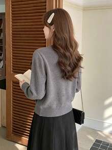 Áo cardigan len dệt kim dáng rộng tay dài cổ tròn, đính nơ, cài nút đơn, màu trơn cho mùa Thu/Đông - Bụi tím - Xem 10