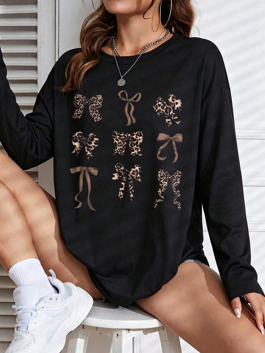 Plus Size Leopard Bow Graphic Crew Neck Long Sleeve T‑Shirt, Cute Ribbon Bow Print Casual Fall Top For Women - Black - View 1