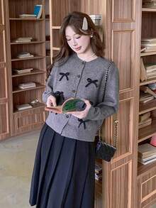 Áo cardigan len dệt kim dáng rộng tay dài cổ tròn, đính nơ, cài nút đơn, màu trơn cho mùa Thu/Đông - Bụi tím - Xem 2