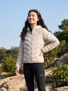 Nike Women's AS W NK TF DWN WPFR WRM JKT Down Jacket Thin Down Jacket - Short IF5884-236 - Brown - View 2