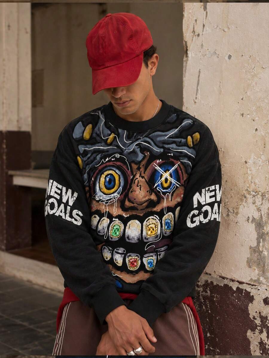 FRACTYR Men's Crew Neck Sweatshirt, Front Large Graffiti Monster Face Gemstone Teeth Print, "NEW GOALS" Letter Long Sleeve Top - Black - View 1