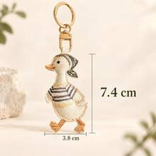1 st broderad nyckelbricka med tecknat motiv, söt liten dockprydnad, charm för väska och ryggsäck, presenttillbehör för helger - Multifärgad - Visa 4
