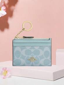 Coach ซองใส่บัตรประจำตัวผ้าแคนวาสลายลายเซ็นแบบมินิสลิม - สีเบบี้บลู - ดู 5