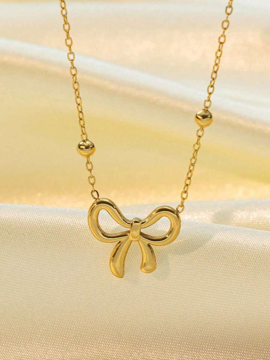 1pc Minimalist Gold Bow Pendant Necklace, Niche Polished Round Bead Collarbone Chain, Versatile Delicate Neck Accessory For Daily Commute - Gold - View 1