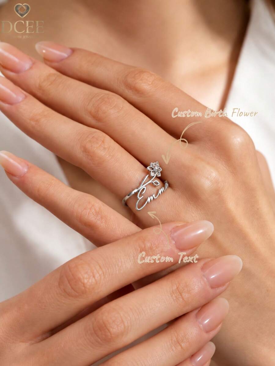 Customized Name Birthday Flower Open Ring, Hollow Floral Design With Handwritten Cursive Name, Elegant And Unique. Selectable Color Open Band Adjustable Size, Comfortable To Wear And Hypoallergenic. Exclusive Personalized Ring, Ideal Birthday Gift, Minimalist High-End Style, Suitable For Various Outfits, Preserving Unique Commemorative Meaning, With Gentle Artistic Elegant. - Custom Birthday Flower Ring - View 1