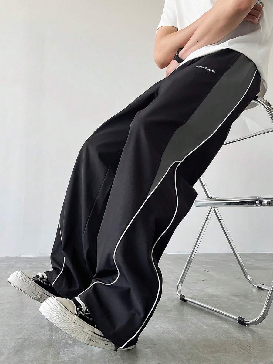 Black & Grey Colorblock Techwear Cargo Pants For Men, Elastic Drawstring Waist, White Trim Hem Design, Small Logo Print, Loose Straight Leg Wide Leg Pants, Versatile For Daily Wear And Sports, Unisex - Black - View 1