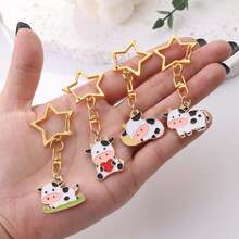 1/4pcs Cute Cow Keychain, Star-Shaped Buckle Design, Colorful Bag Pendant Charm, Suitable For Handbags, Backpacks, Keys And Zipper Decoration, Christmas Holiday Small Gift - Quantity - View 13