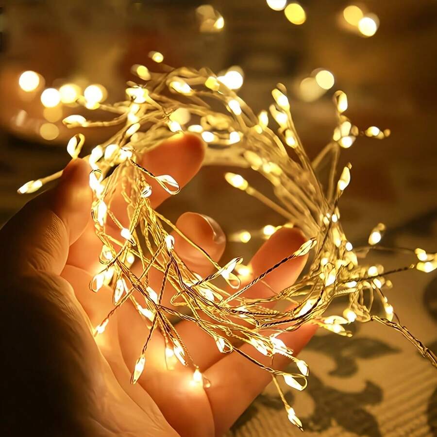 Christmas Halloween Warm Color Solar Powered Firecracker Fairy String Lights, Available In 5M100LED, 8M200LED, 11M300LED Three Specifications, Suitable For Various Yard And Window Display Scenes. The Cluster Light Beads Simulate Firecracker Shape, With Compact Arrangement, Warm Light Flows Gently, Creating A Romantic Atmosphere Like A Sky Full Of Sparkling Fireworks. Solar Powered System, Collects Sunlight Energy During The Day, Light-Controlled Sensor Automatically Detects Day And Night