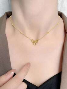 1pc Minimalist Gold Bow Pendant Necklace, Niche Polished Round Bead Collarbone Chain, Versatile Delicate Neck Accessory For Daily Commute - Gold - View 3