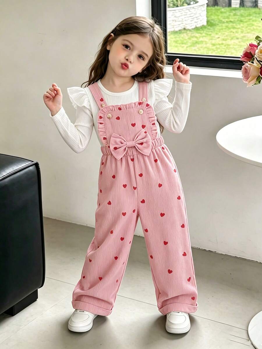 Baby Girls Heart-Shaped Overall Set 2pcs, Inner Layer Vertical Ribbed Flutter Sleeve Long Sleeve Undershirt Soft Skin-Friendly + Pink Corduroy Overall Pants With All-Over Heart Print, Lace Placket With Large Bow Decor, Adjustable Button Shoulder Strap Design, Sweet And Gentle For Daily Wear, Photos, Toddler Spring/Autumn Preppy Style Children's Clothing - Pink - View 1